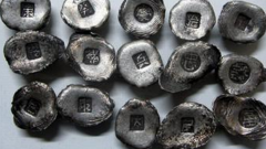 山西高阳镇村民发现数十枚银元宝